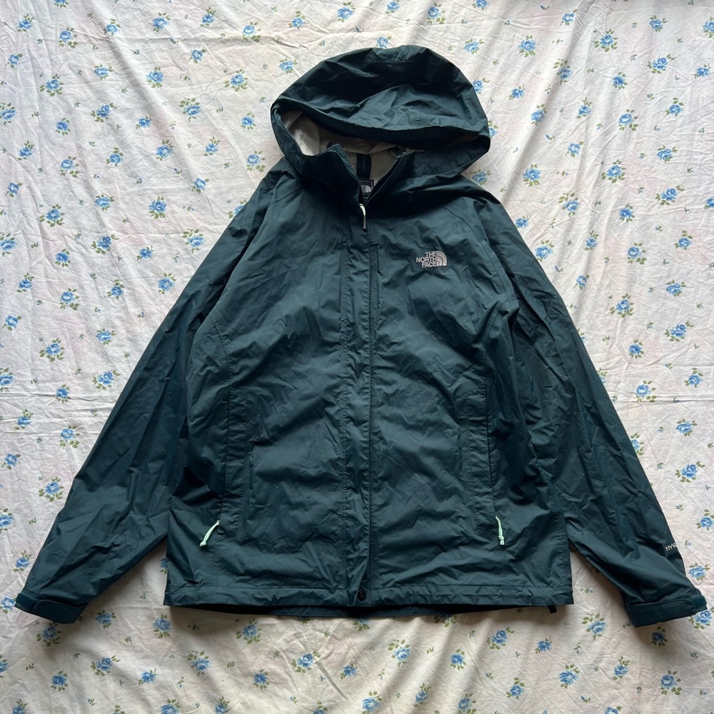 Green North Face windbreaker